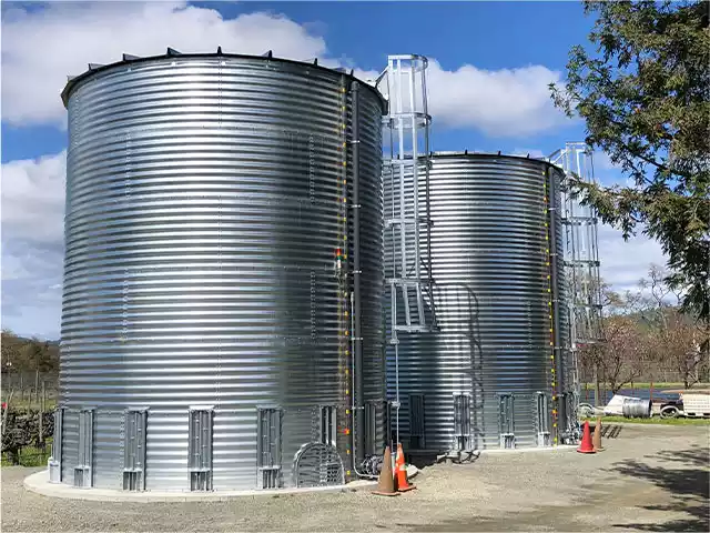 corrugatedd water tanks with access ladder installed