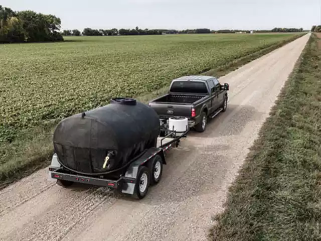 black sump tank on trailer